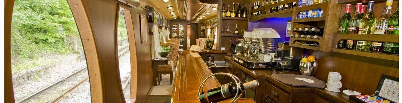 Spend time in the bar onboard while watching Spain pass by in the large windows